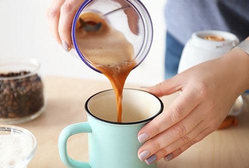 Bulletproof coffee - pouring into a cup