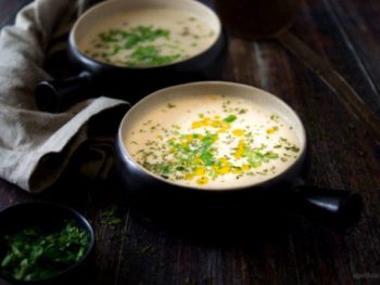 2 bowls of Cauliflower Cheese Soup, sprinkled with herbs