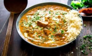 Low-Carb Butter Chicken Curry in a bowl with cauliflower rice