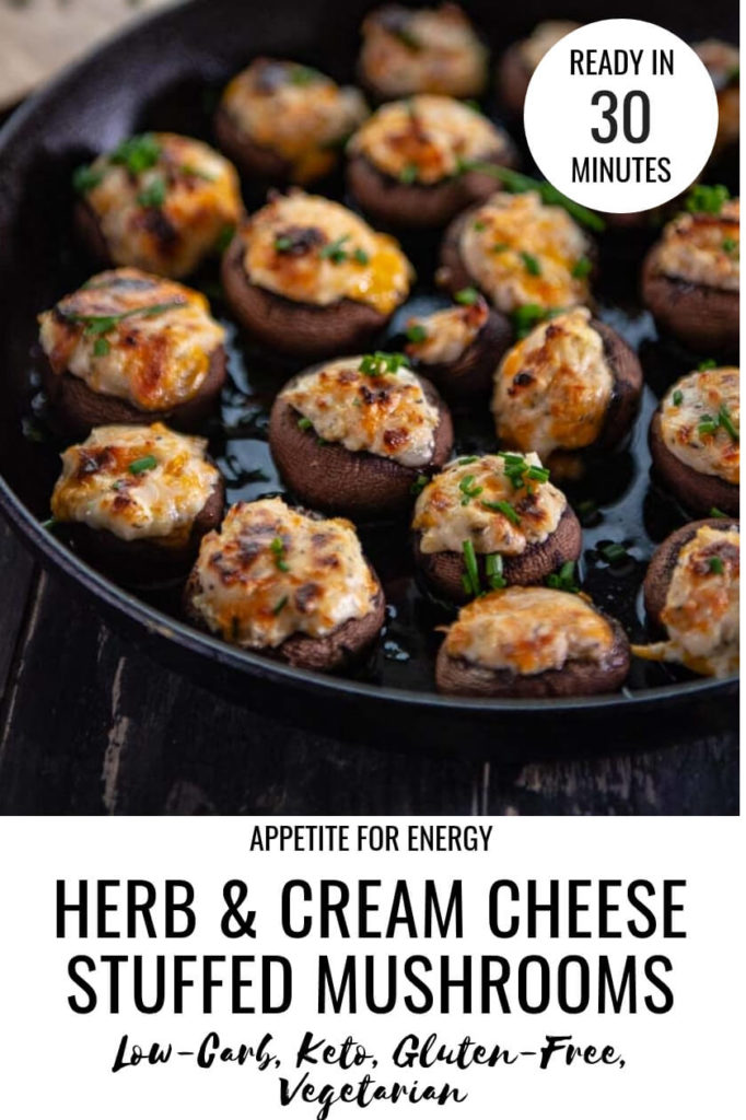 Herb and Cream Cheese Stuffed Mushrooms in the skillet with fresh chives on top