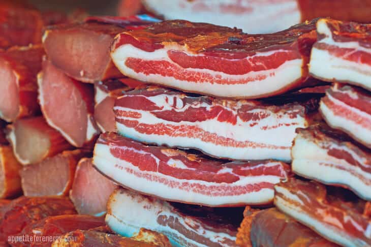 A stack of cured Bacon (cut from pork belly)