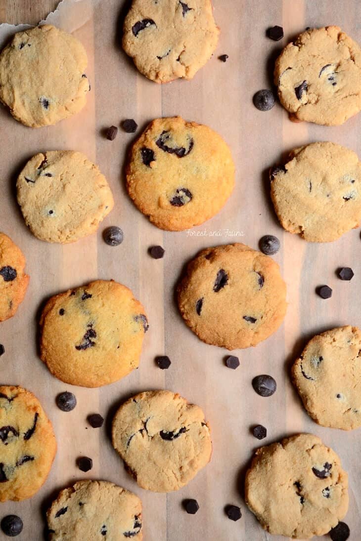 Overhead shot of Chocolate chip cookies on a wooden board