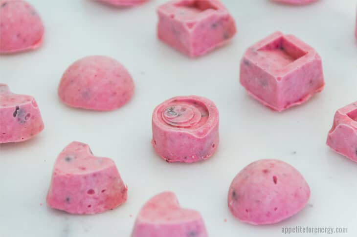 Keto Chocolate Strawberry Ice-Cream Bites lined up in different shapes