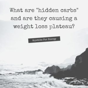 Quote What are hidden carbs? written over a rocky ocean coastline