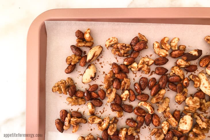 Maple Spiced nuts on tray ready to bake