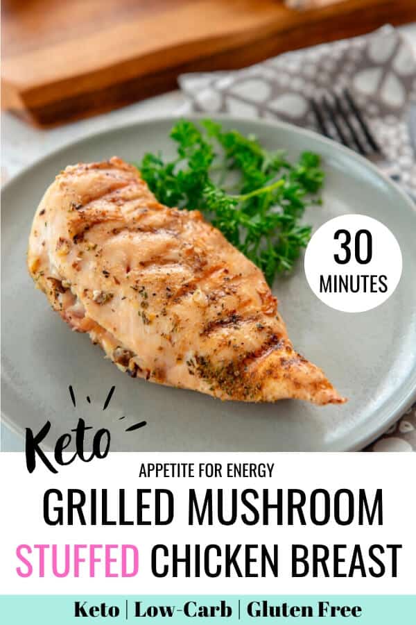 KETO Grilled Mushroom Stuffed Chicken Breast on grey plate with parsley