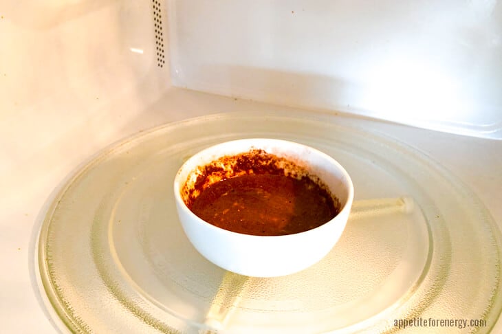 Cooking keto mug cake in microwave